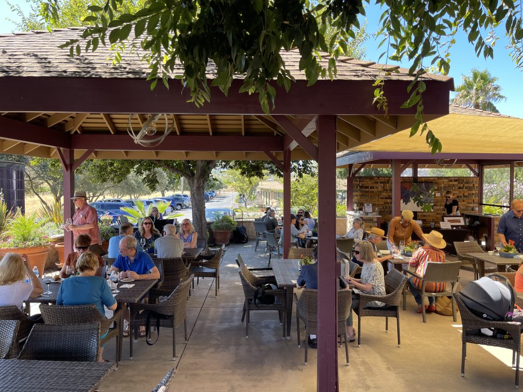 A photograph of our Tasting Patio during a well-attended, summertime club release.